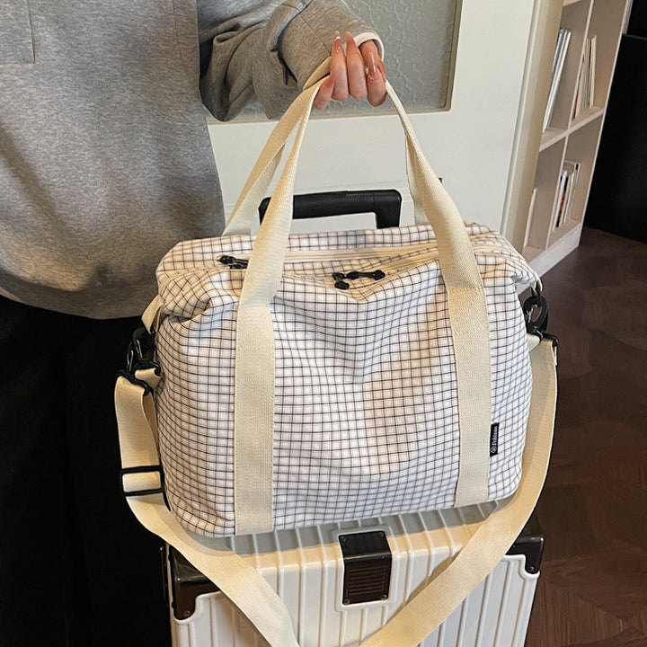 Gestreifter Reise-Duﬄe