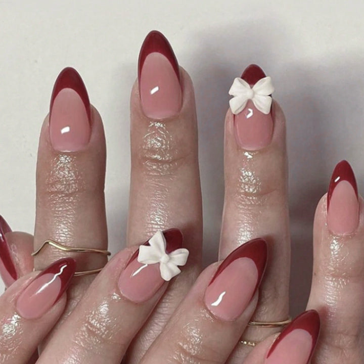 Kunstnagelset mit elegantem Spitzen-Design und romantischen Schleifen Karnz
