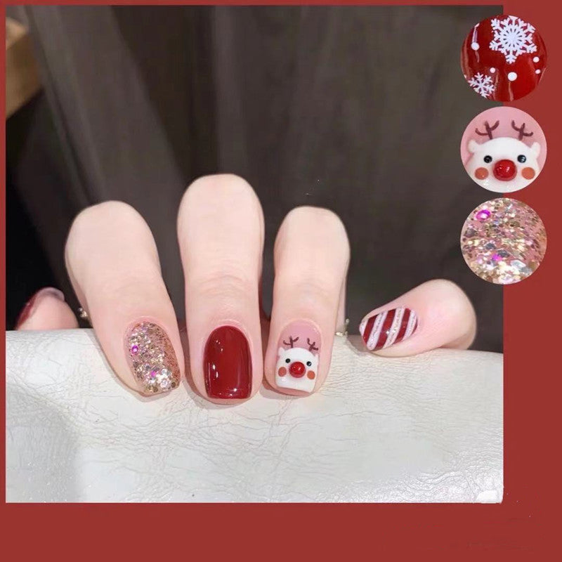 Kunstnagel Design mit festlichem Weihnachtsmotiv Karnz