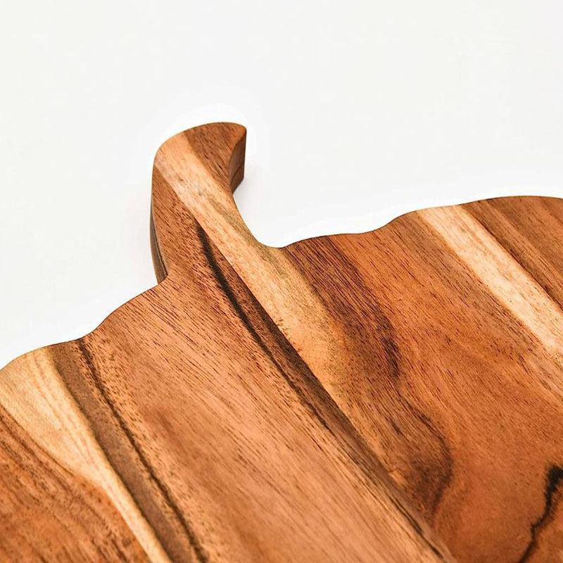 Holz-Schneidebrett in Kürbis-Silhouette aus Akazienholz mit ergonomischem Griff