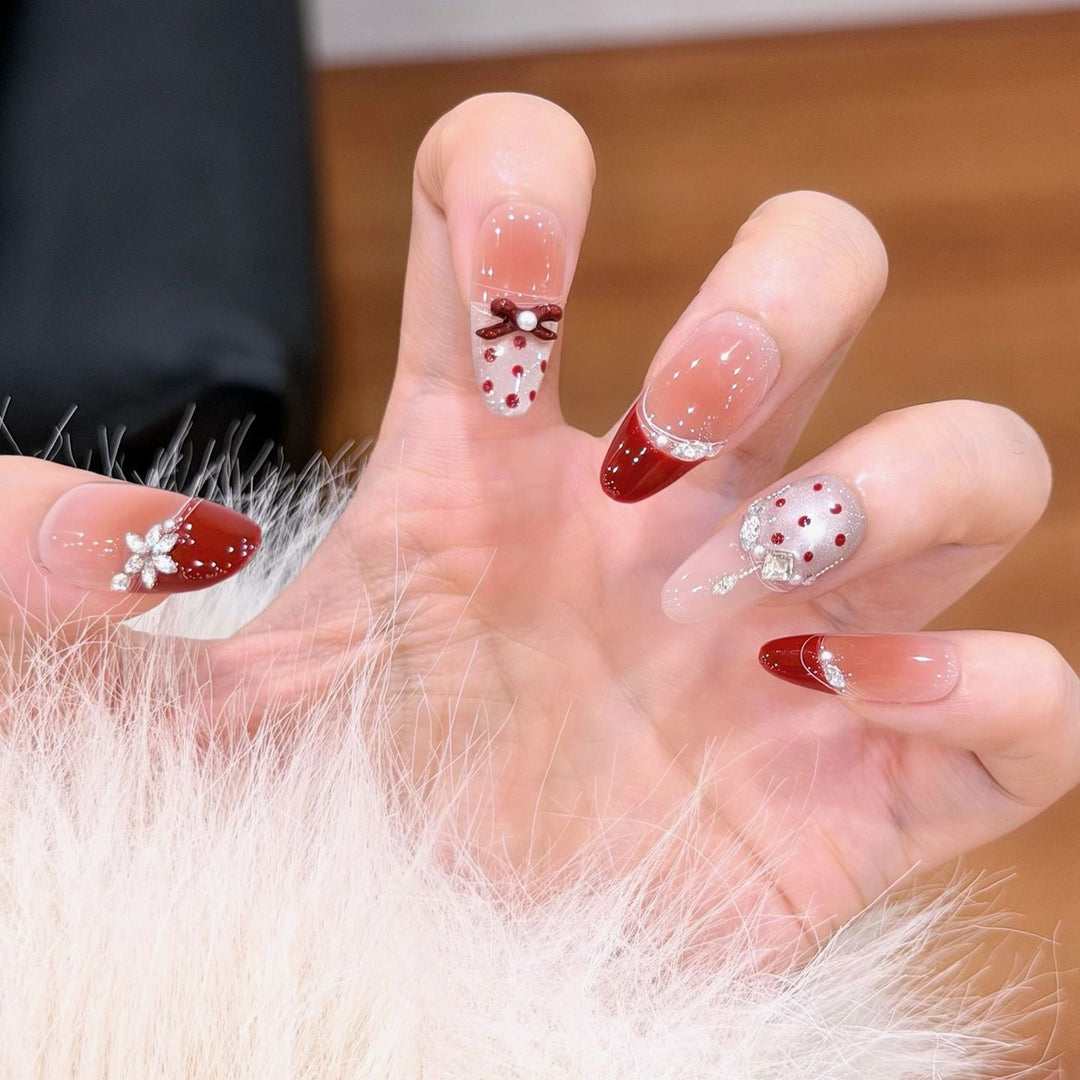 Künstlerisches Press-On-Nagel-Set mit elegantem Bogen und Schmuckstein-Dekor Karnz