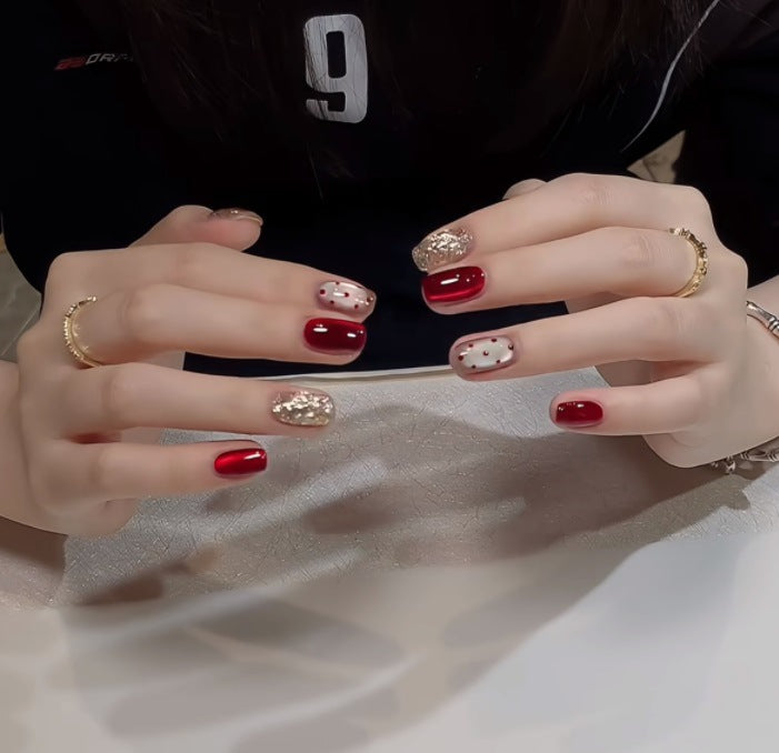 Dekoratives Press-On-Nagelset mit Stern- und Schleifenmotiven Karnz