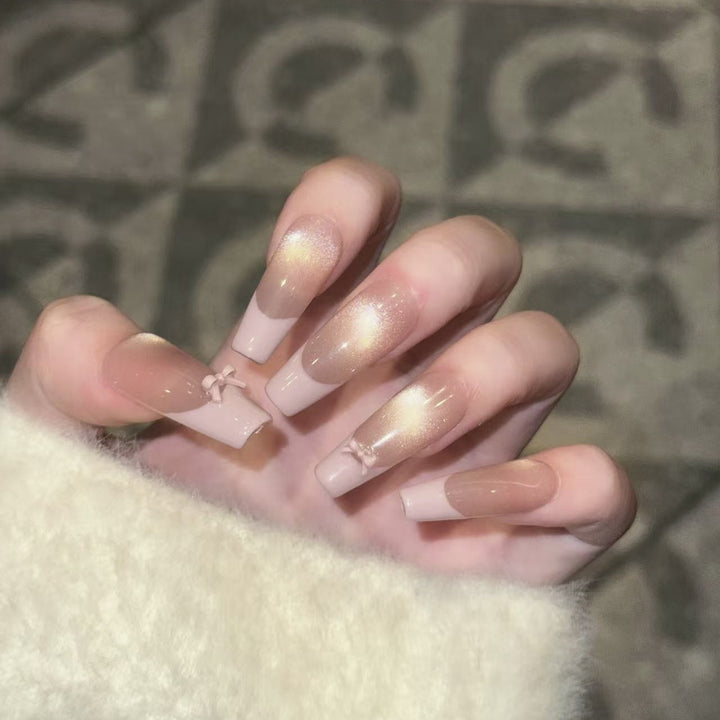 Wiederverwendbares Press-On-Nagelset mit eleganten Schleifenakzenten Karnz