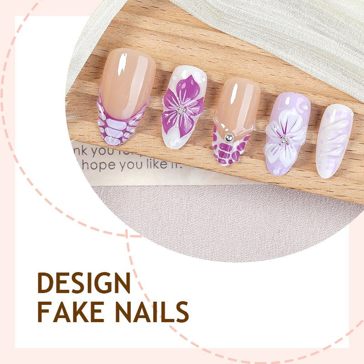 Kunstnagelset mit floralen und glamourösen Akzenten Karnz