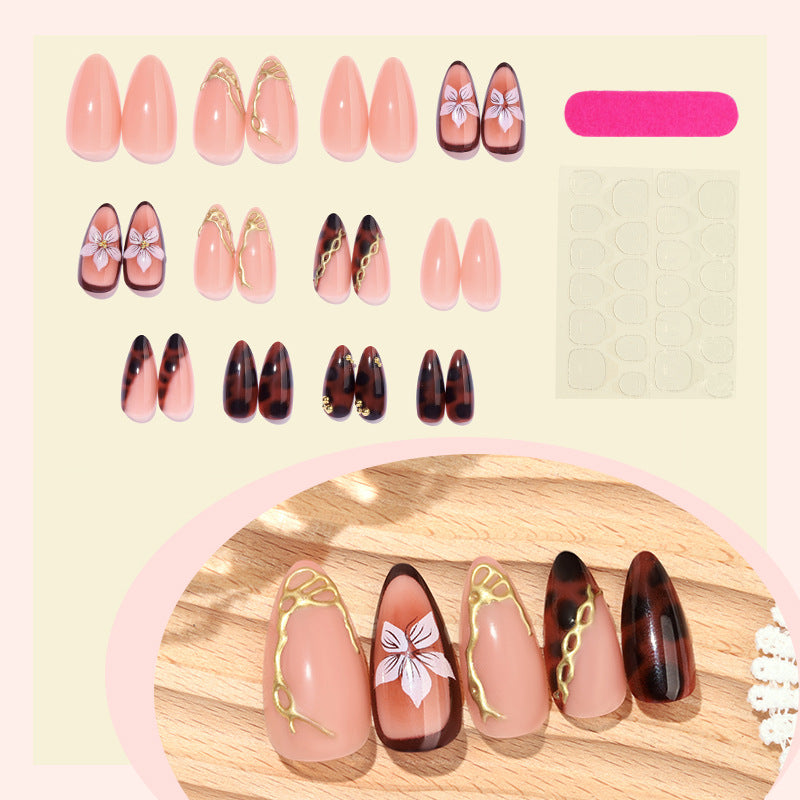 Künstlerisches Press-On-Nagelset mit eleganten Blumen- und abstrakten Designs Karnz
