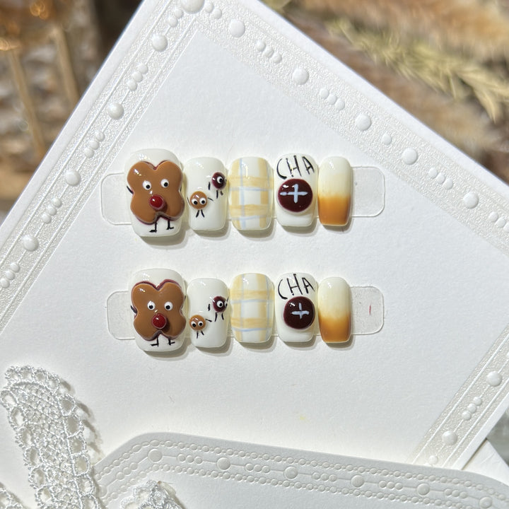 Verspieltes Lebkuchen Press-On Nagelkunst Set Karnz