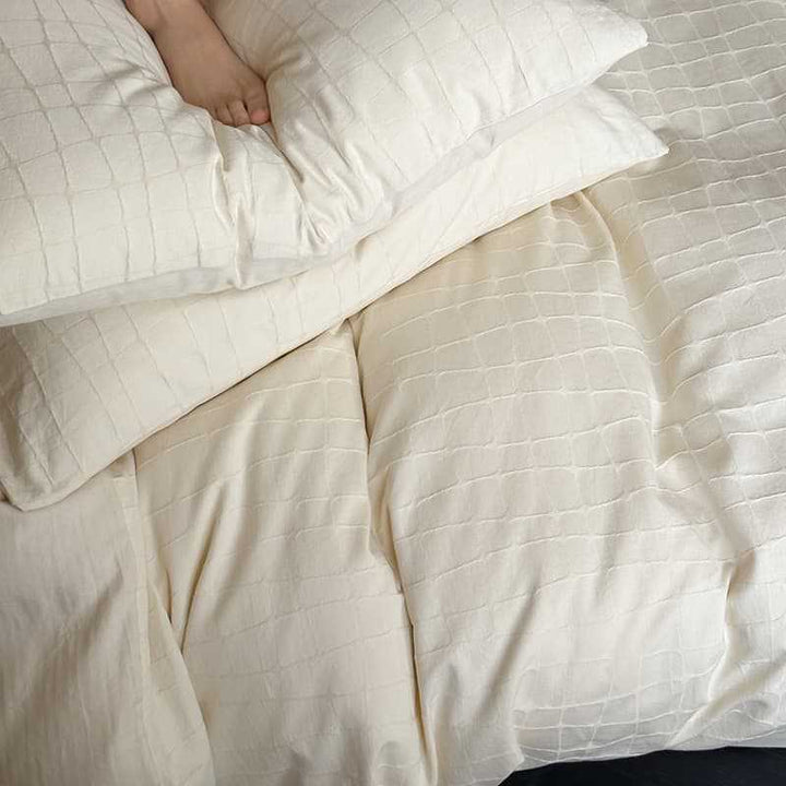 Gepflegtes Percale-Baumwoll-Bettwäsche-Set mit subtiler welliger Textur und Umschlagverschluss