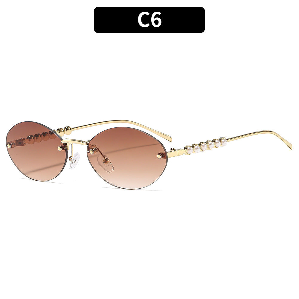 Elegante ovale Rahmen-Sonnenbrille mit dekorativen Perlenakzenten