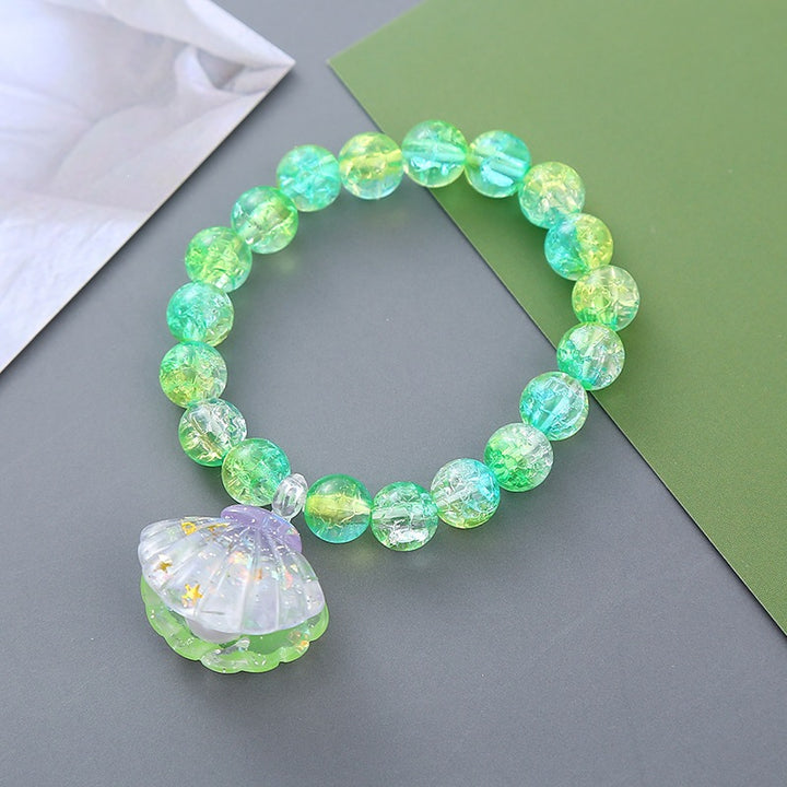 Verspieltes Armband mit Muschel-Anhänger Karnz