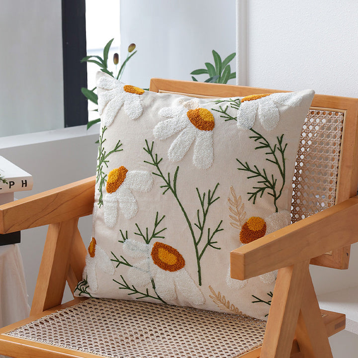 Dekoratives Kissen mit floralem Stickdesign