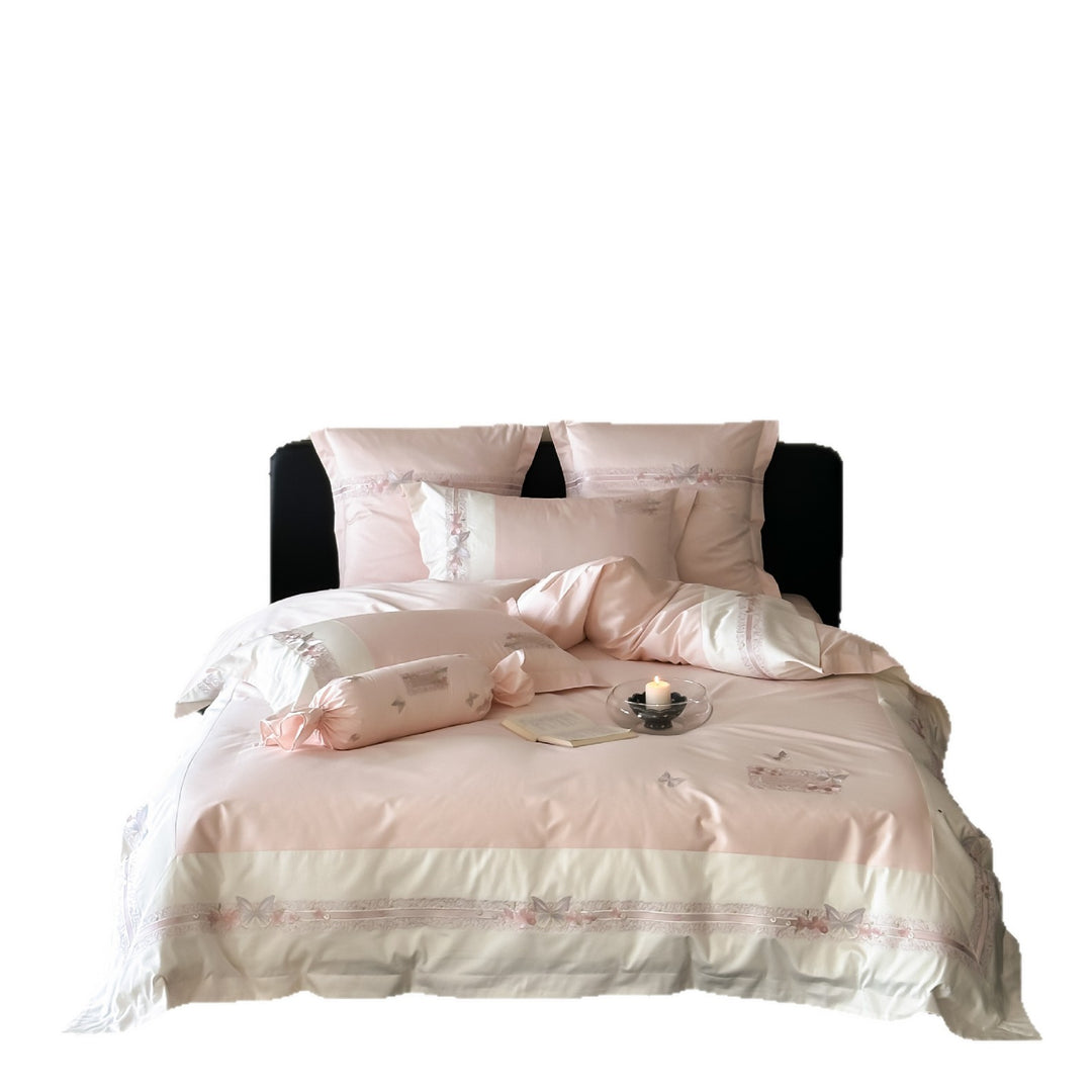 Luxuriöses Baumwollsatin‑Bettwäscheset mit applizierten Blumen und Zierrollsaum