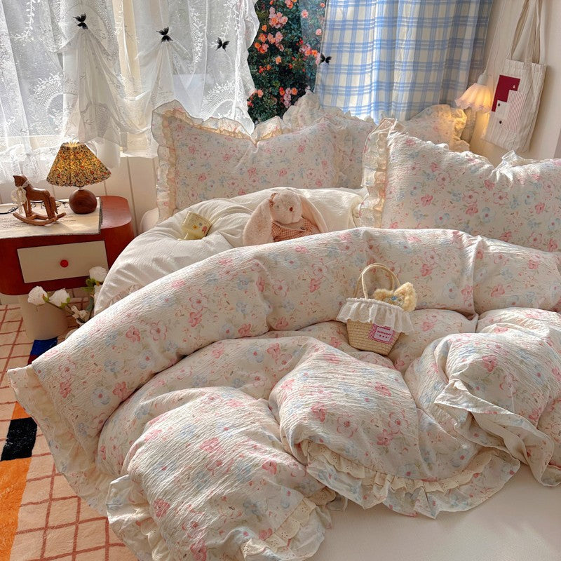 Blumenverziertes Steppbett-Set