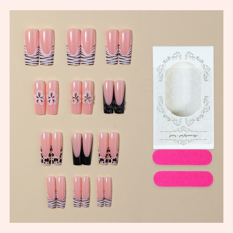 Kunstnagelset mit extravaganten Blumen- und Tierdesigns Karnz