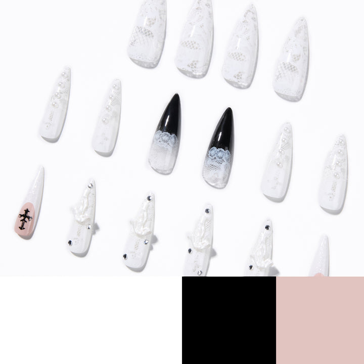 Kunstvolle Stiletto-Nägel mit einzigartigen 3D-Elementen und Glitzerakzenten Karnz