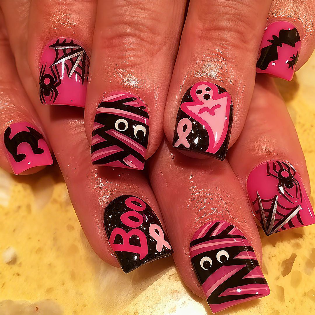 Halloween Kunstnägel mit verspielten Motiven und Glitzerdetails Karnz