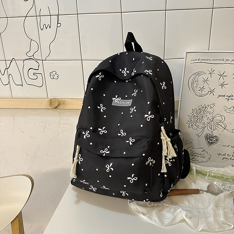 Verspielt gemusterter Rucksack
