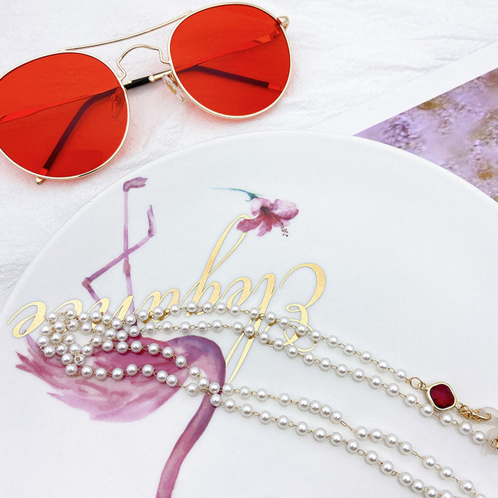 Elegante Perlenkette mit Goldenen Akzenten Karnz