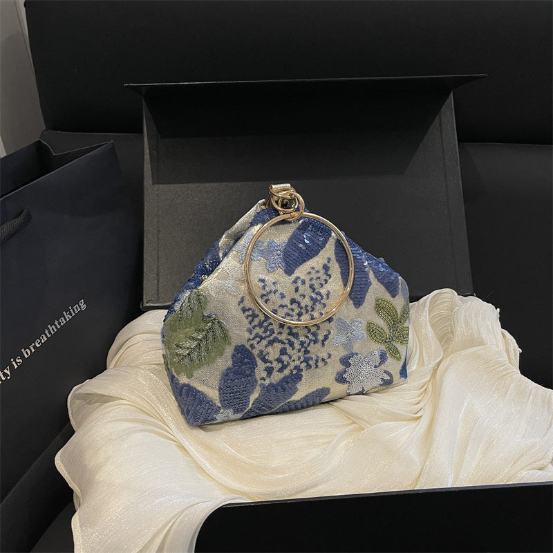 Elegante gestickte Clutch