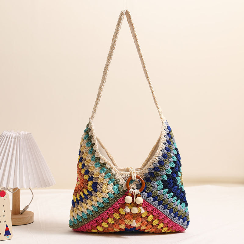 Damen Handtasche mit kunstvollem Flechtmuster Karnz