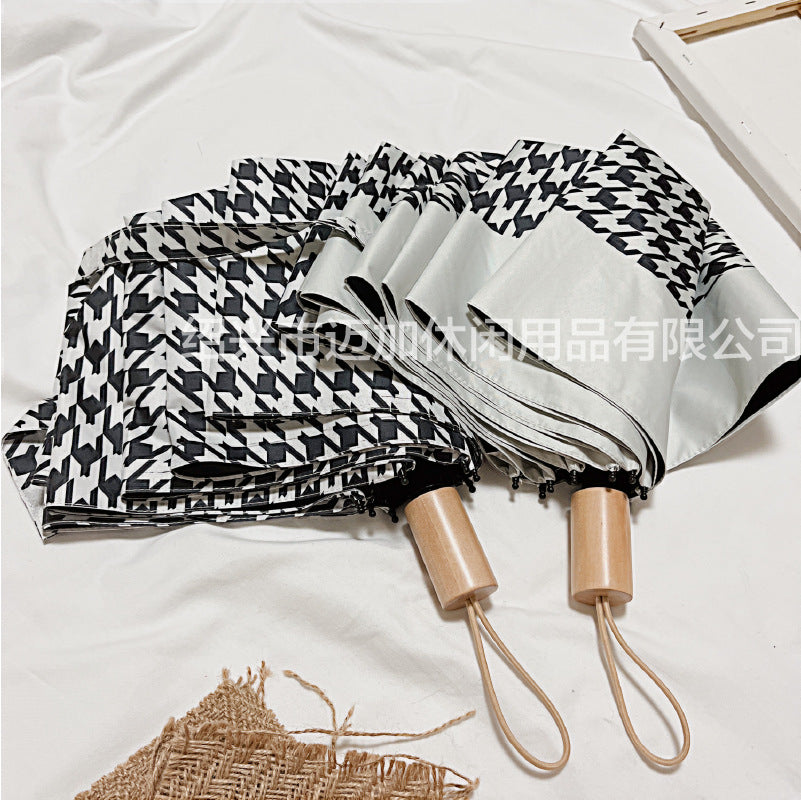 Damen Faltbarer Designer Regenschirm mit stylischem Zickzack-Muster Karnz