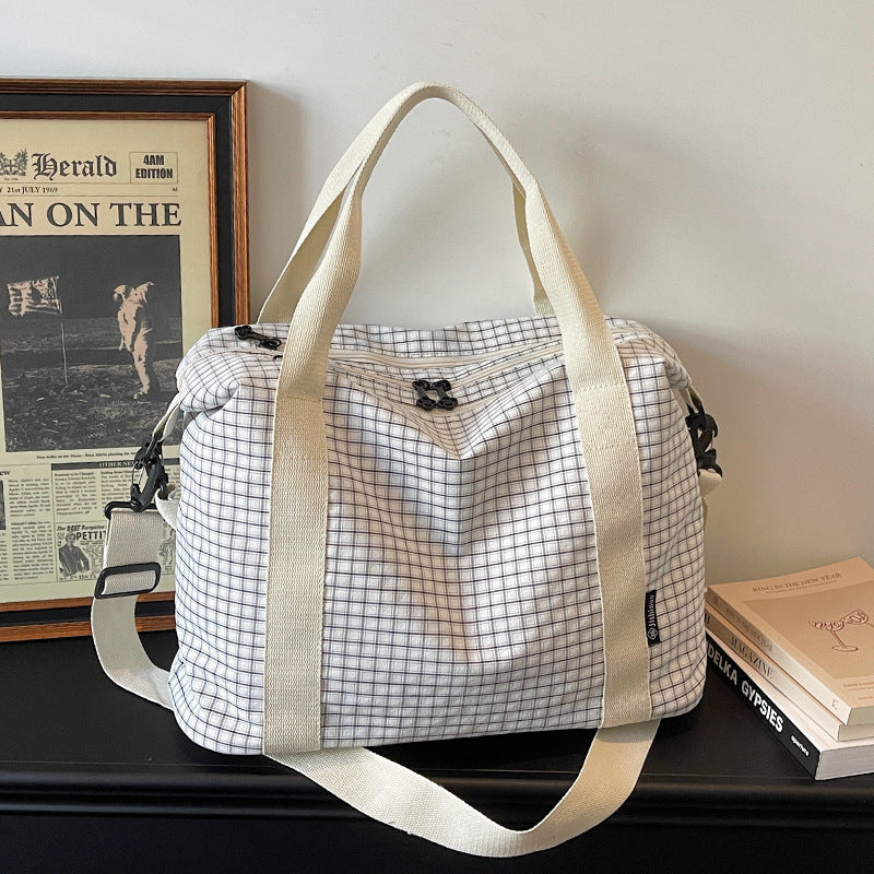 Gestreifter Reise-Duﬄe