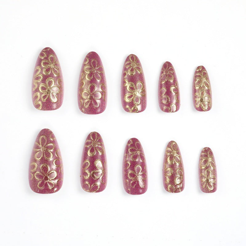 Glitzernde Kunstnägel mit floralen Mustern Karnz