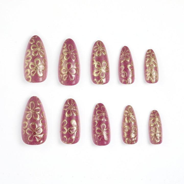 Glitzernde Kunstnägel mit floralen Mustern Karnz