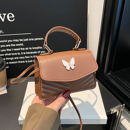 Schmetterlings-verzierte Handtasche