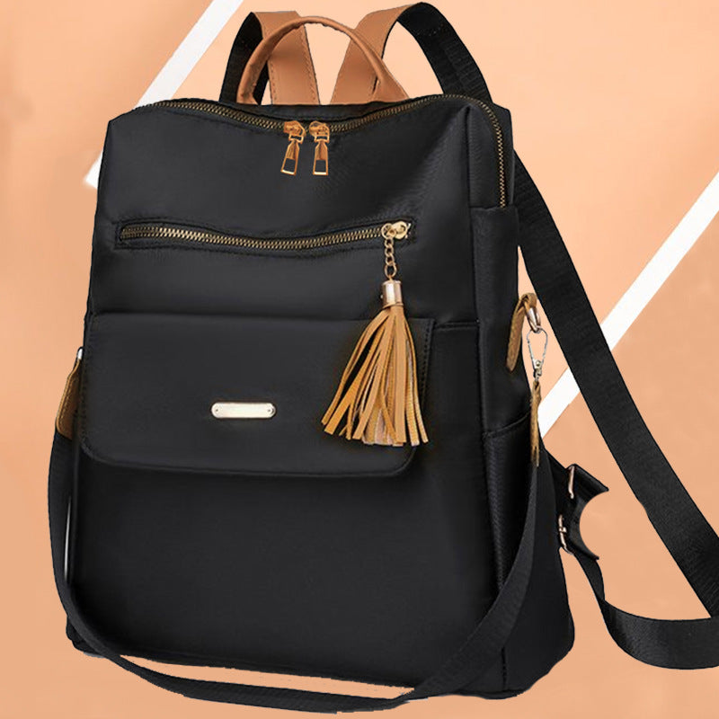Multifunktionaler Rucksack mit dekorativem Quast Karnz