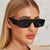 Damen modische Sonnenbrille mit futuristischem Design und transparenten Rahmen Karnz