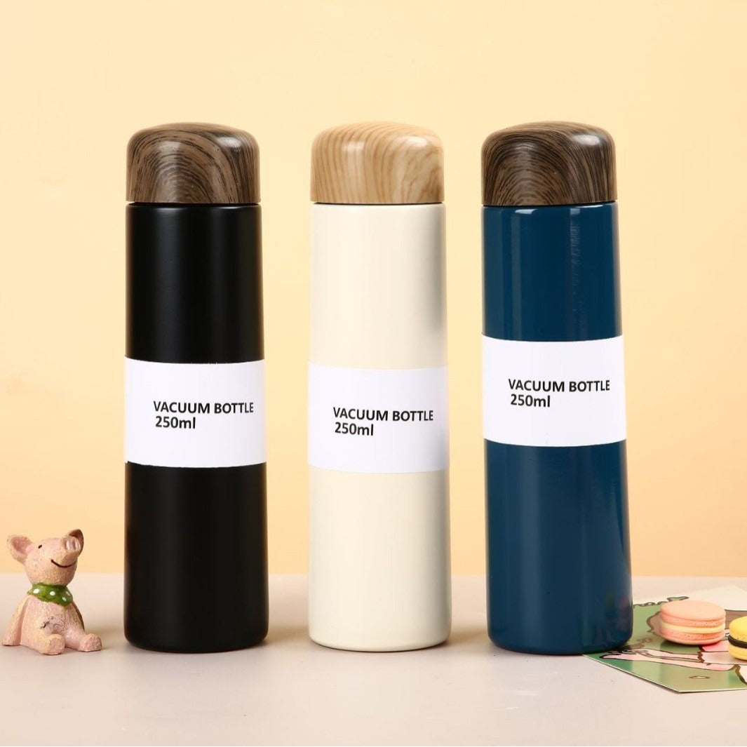Damen vakuumisolierte Wasserflasche mit innovativem Holzdeckel Karnz