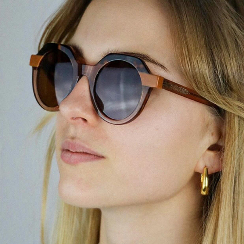 Damen extravagante runde Sonnenbrille mit farblich akzentuiertem Rahmen Karnz