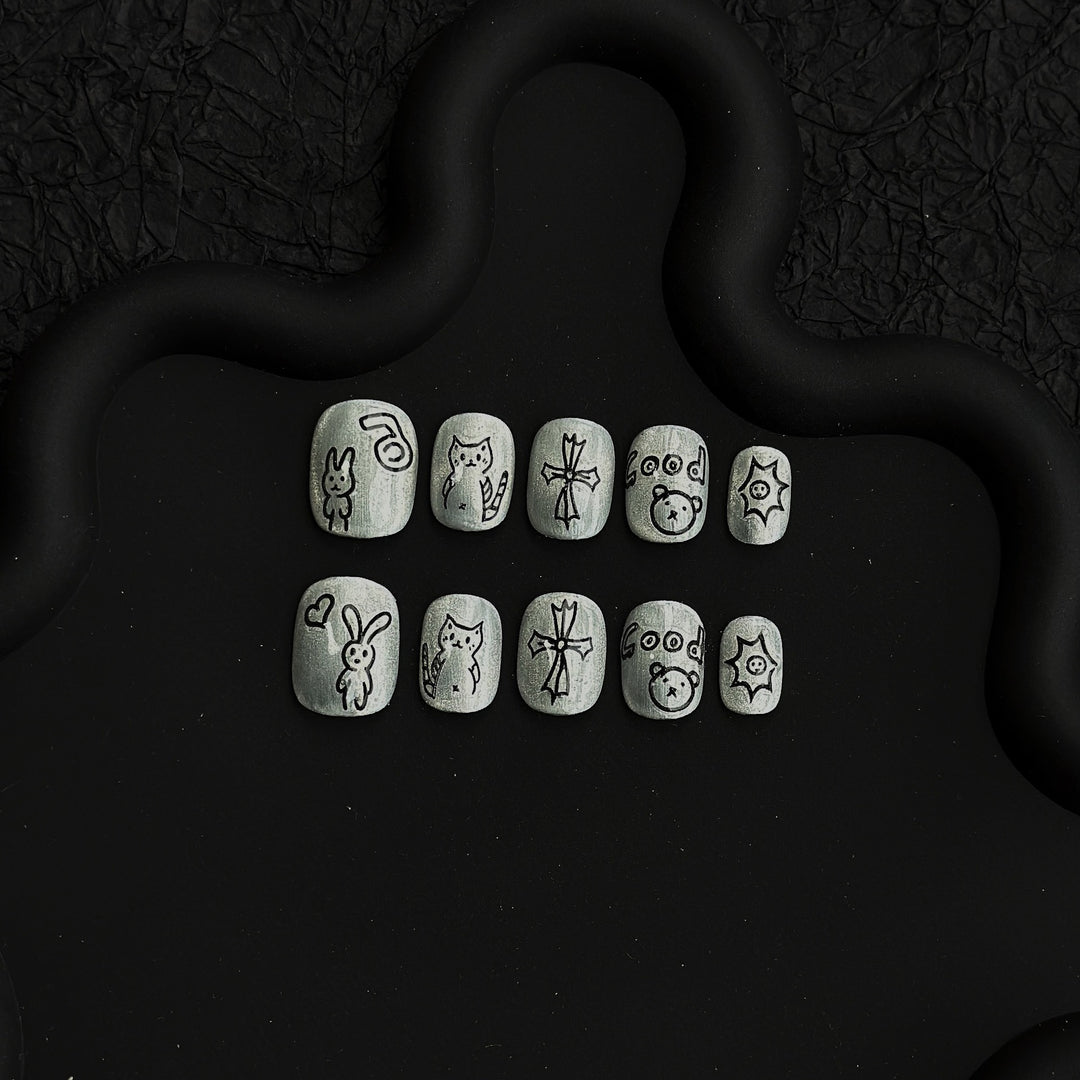 Verspieltes illustriertes Press-On-Nagelkunst-Set