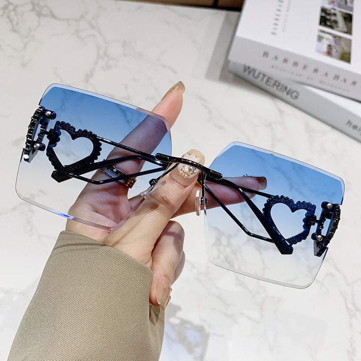 Damen modische Sonnenbrille mit trendigem Herz-Design Karnz
