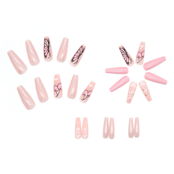 Kunstnagelset mit romantischen Schmetterlingsdesigns und Glitzerakzenten Karnz