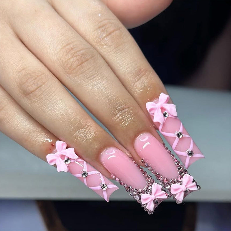 Dekorativer Press-On Fingernagelset mit elegantem Bogen und Juwel-Akzenten Karnz 1788496283
