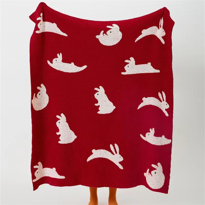 Kuscheldecke aus Jacquardstrick mit Hasenmotiven Karnz