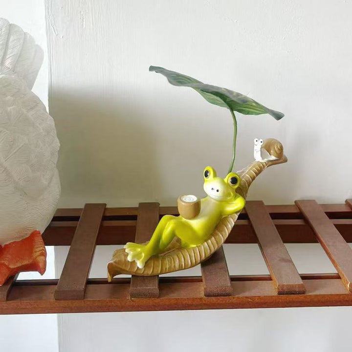 Lustige Froschfigur mit Blatt Deko Karnz