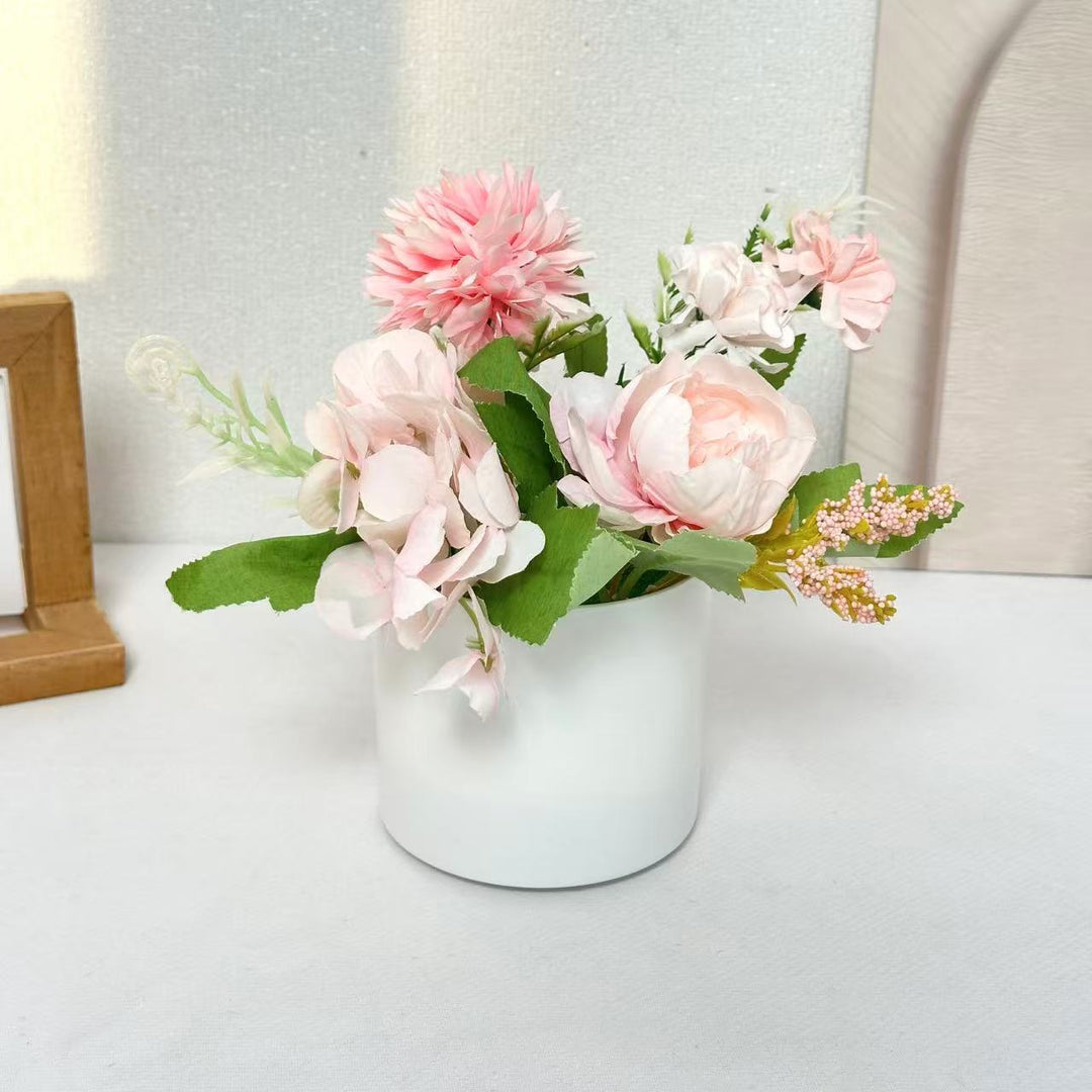 Dekoratives Blumenmittelstück für Tischdekoration