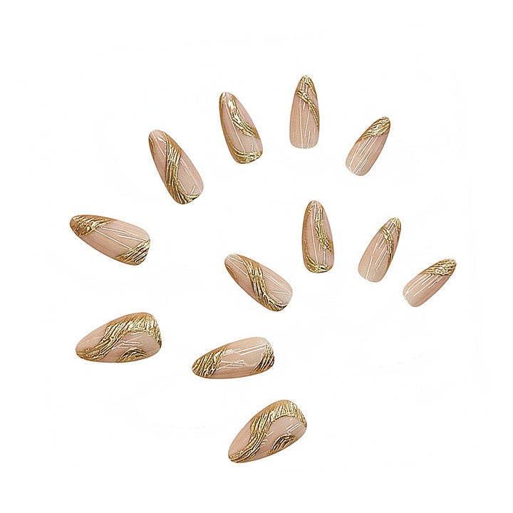 Künstlerisches Press-On Nagelset mit goldener Wirbel-Design Karnz