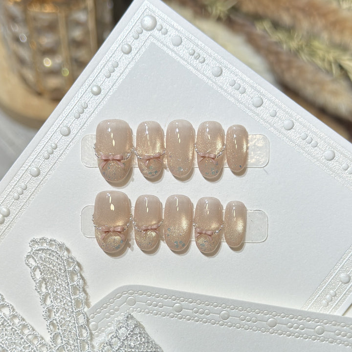 Press-On-Nagelkunst-Set mit eleganten Schleifenakzenten Karnz