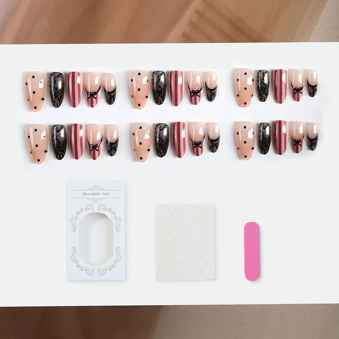 Kunstnagelset mit eleganten Schleifen- und Spitzenakzenten Karnz