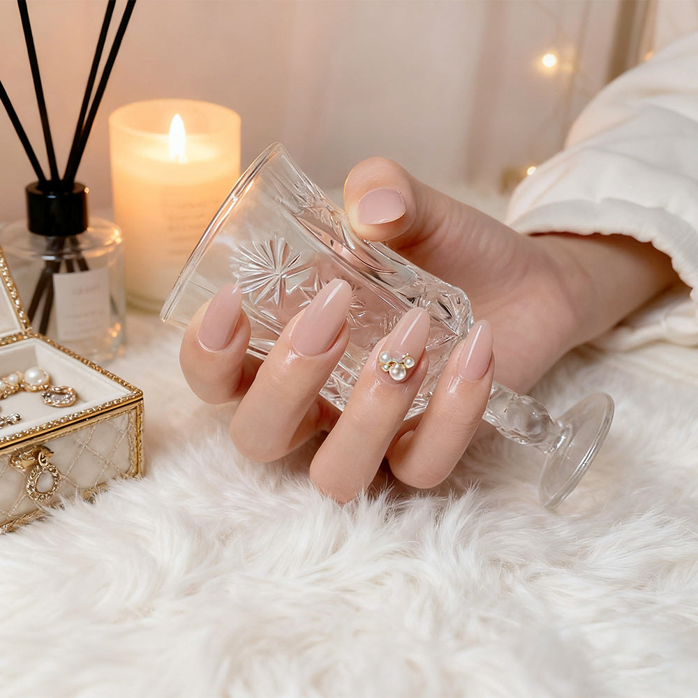 Kunstnagelset mit elegantem Perlendesign und hochglänzender Oberfläche Karnz