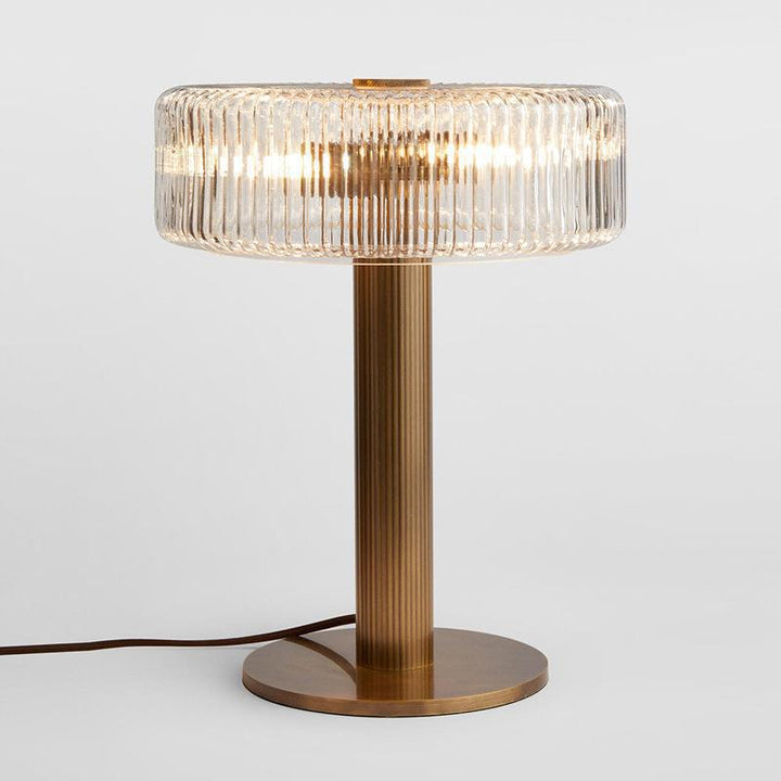 Elegante gerippte Glas- und Goldtischlampe