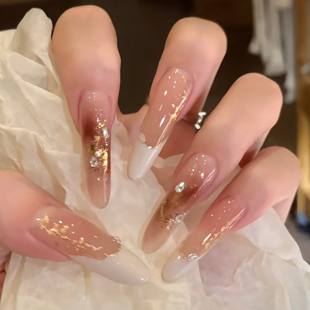 Elegantes Stiletto Press-On Nagelset mit floralem und glitzerndem Design Karnz