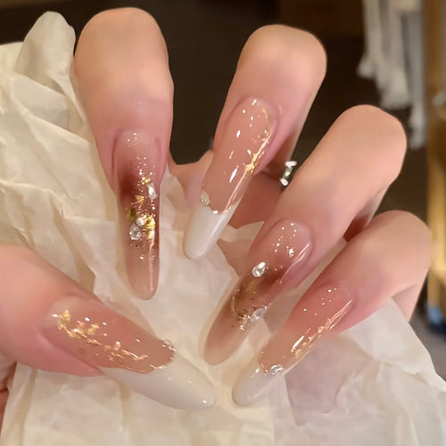 Elegantes Stiletto Press-On Nagelset mit floralem und glitzerndem Design Karnz