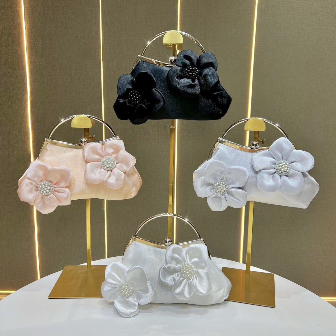 Florale Akzent Clutch