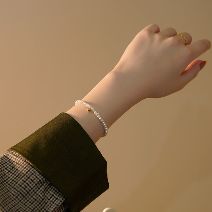 Perlenarmband mit Feinem Goldakzent Karnz