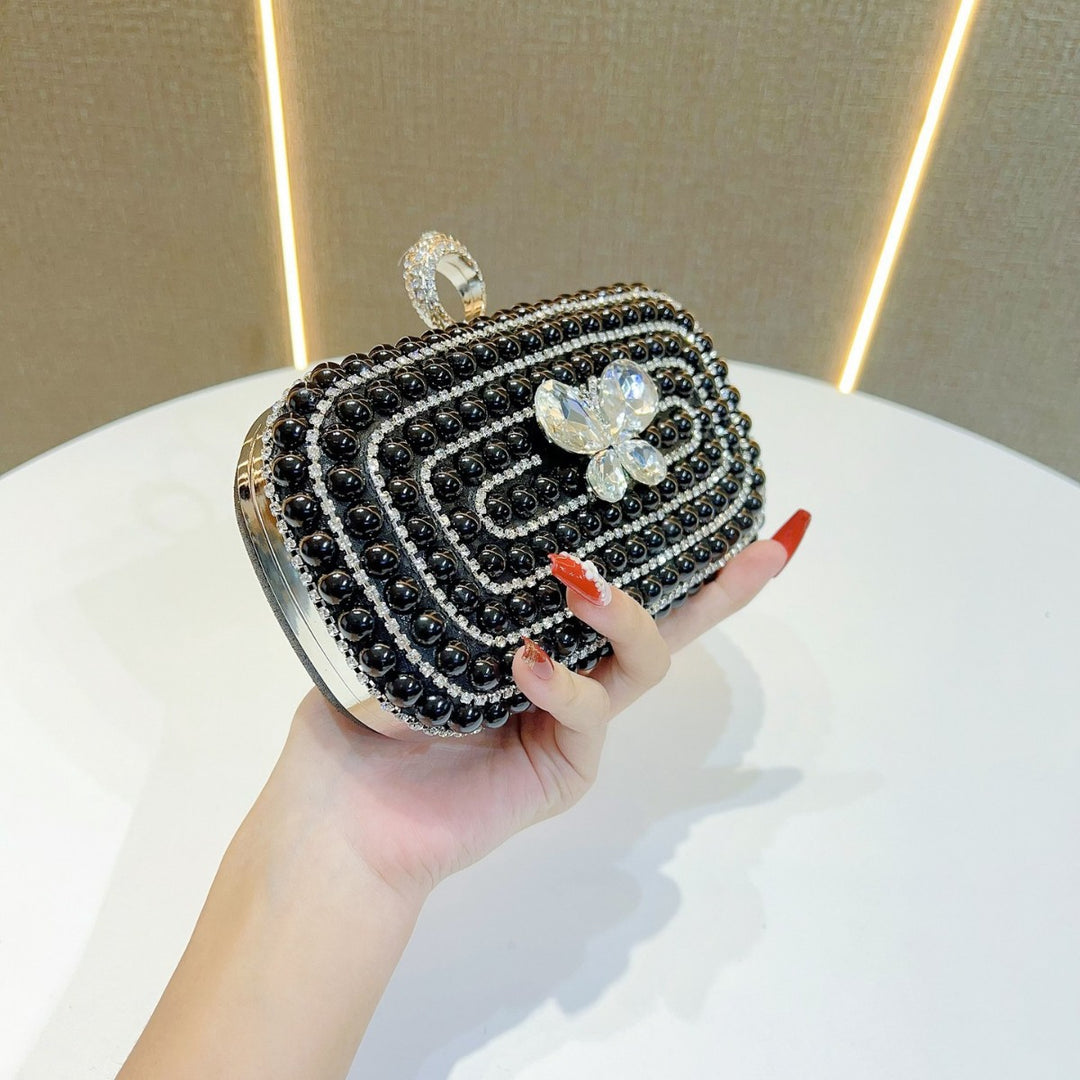 Perlenbesetzte Schmetterlings-Abend-Clutch