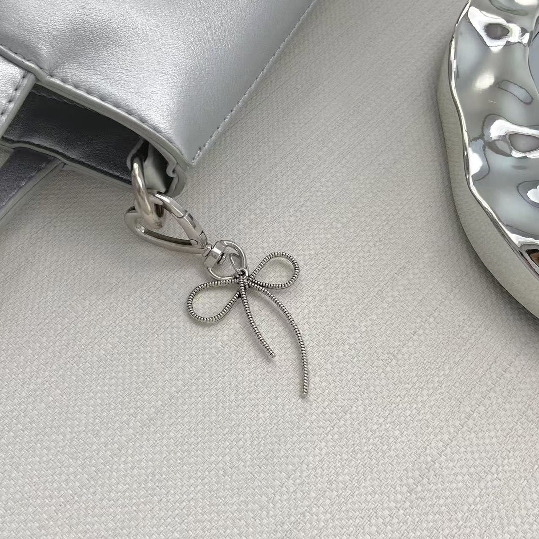 Elegante bogenförmige Schlüsselanhänger Karnz 1787102672